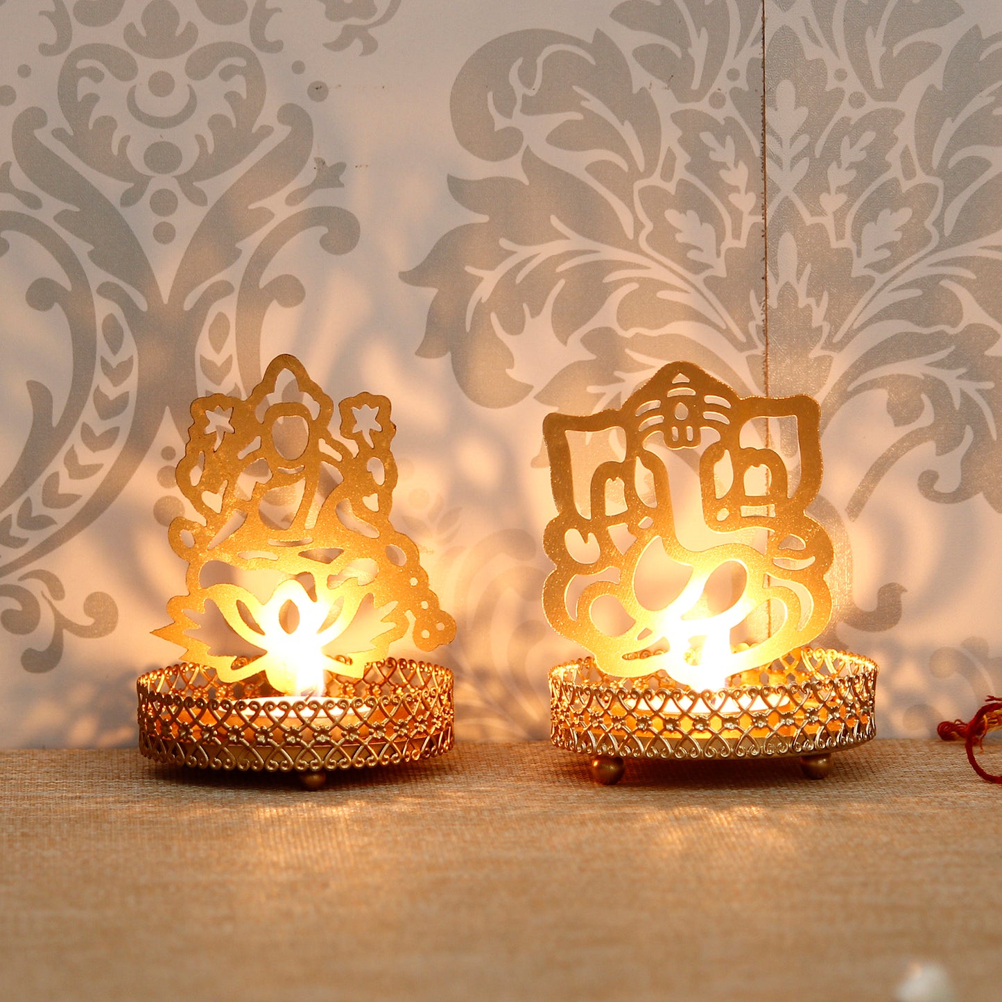 eCraftIndia Lord Ganesha and Laxmi Shadow Tea Light Holder - Utility Mart